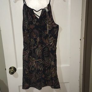 - NWT Black Floral Romper with Pockets. Large